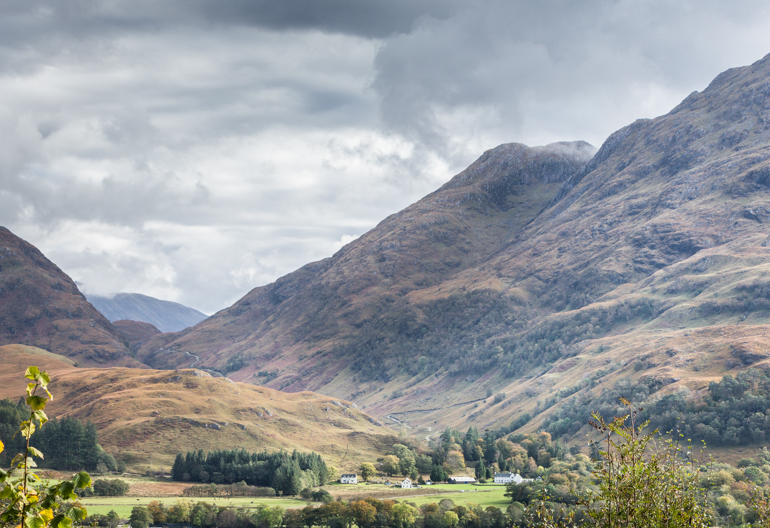 An aerial view of a valley between two Munros.